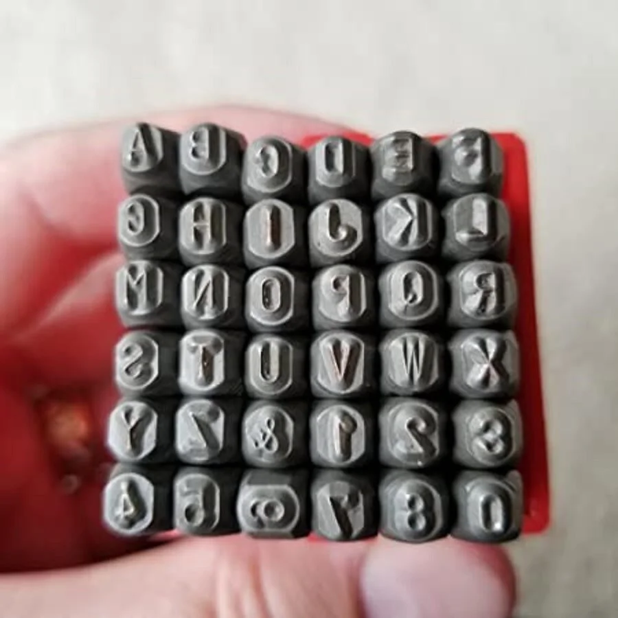 I have a small set of heavy iron letter stamps sitting at home.